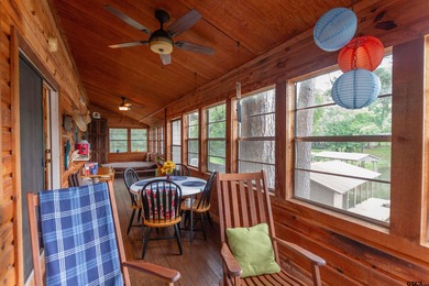 Step into timeless character and lakeside charm with this unique - photo 17