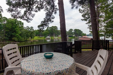 Step into timeless character and lakeside charm with this unique - photo 18