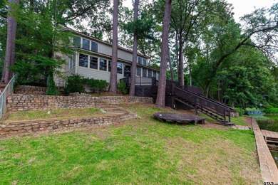 Step into timeless character and lakeside charm with this unique - photo 19