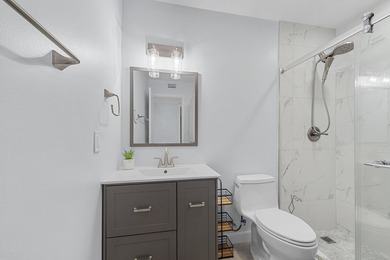 Welcome to this stunningly renovated 2 bed, 2 bath condo in the - photo 21