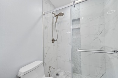 Welcome to this stunningly renovated 2 bed, 2 bath condo in the - photo 22
