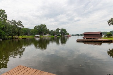 Step into timeless character and lakeside charm with this unique - photo 23