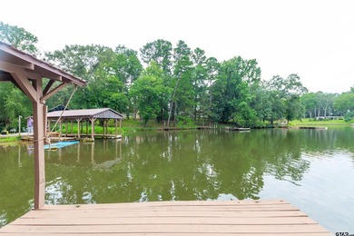 Step into timeless character and lakeside charm with this unique - photo 24