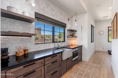 First time offered, this 2023 custom estate in the gated - photo 40