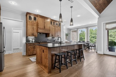 Experience contemporary living in this stunning custom-built - photo 9