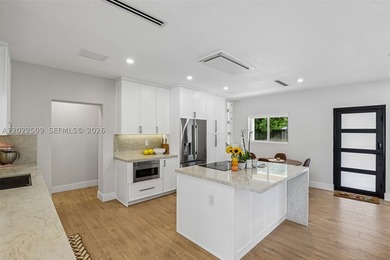 Completely remodeled 4 bedroom, 3 bath waterfront home in the - photo 8