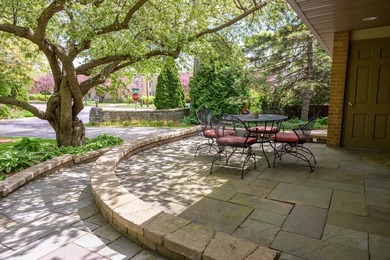 OPEN HOUSE CANCELED! Tucked into a beautiful village setting - photo 2