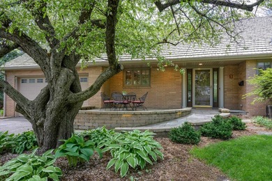 OPEN HOUSE CANCELED! Tucked into a beautiful village setting - photo 4