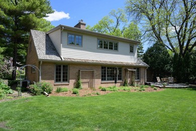 OPEN HOUSE CANCELED! Tucked into a beautiful village setting - photo 5