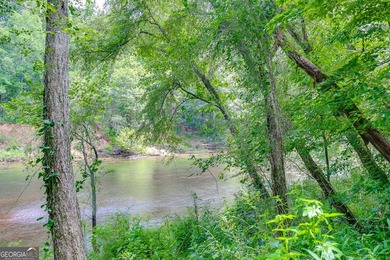 Rare opportunity to own a stunning riverfront estate tucked away - photo 44