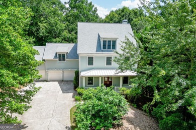 Rare opportunity to own a stunning riverfront estate tucked away - photo 50