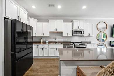 Welcome to this beautiful 3-bedroom, 2.5-bath lakefront retreat - photo 5