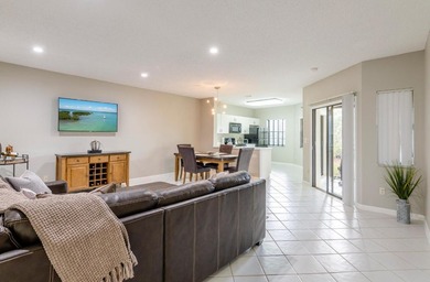 This 2 bedroom 2 bath condo offers the ease of first floor - photo 2