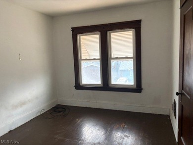 Unlock the potential at 521 E 112th St, Cleveland, Ohio 44108 - photo 14