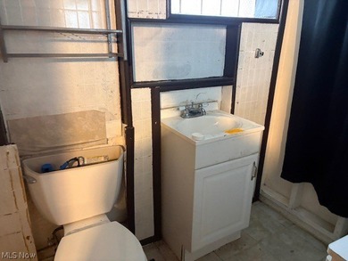 Unlock the potential at 521 E 112th St, Cleveland, Ohio 44108 - photo 16