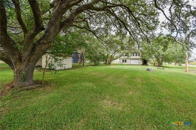 Bay breeze and shade trees await at 225 Swallow Dr. in gated - photo 42