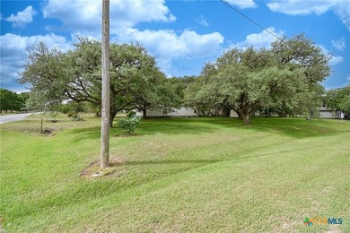 Bay breeze and shade trees await at 225 Swallow Dr. in gated - photo 44