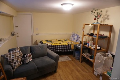 This split-level home in Lindenhurst features four spacious - photo 7