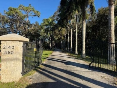 Lake Acreage For Sale in Loxahatchee Groves, Florida