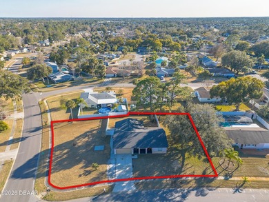 Situated on an oversized corner lot just under half an acre - photo 2