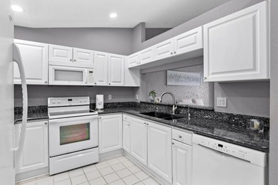 Welcome to this well-maintained 3-bedroom, 2-bath lakefront - photo 10