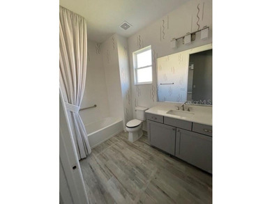 This former model home truly has it all. The highly sought-after - photo 9