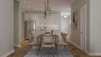 The Addison plan is an interior two-story townhome with the - photo 3