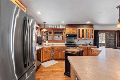 Escape to the Northwoods with this inviting half-log home on - photo 6