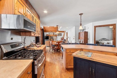 Escape to the Northwoods with this inviting half-log home on - photo 9