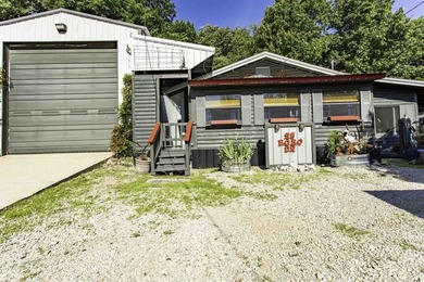 Discover a truly unique property in Hardy, Arkansas-ideal for a - photo 1