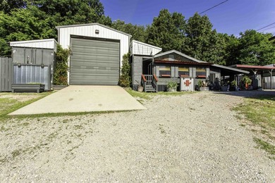 Discover a truly unique property in Hardy, Arkansas-ideal for a - photo 2