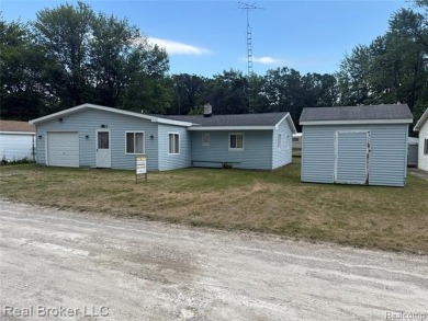 Lake Home Sale Pending in Mckinley, Michigan