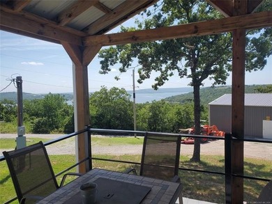 BREATHTAKING LAKE VIEW & PREMIUM UPGRADES! Nestled on a super - photo 3