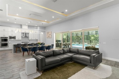 Captivating water and golf course views set the stage for a chic - photo 3