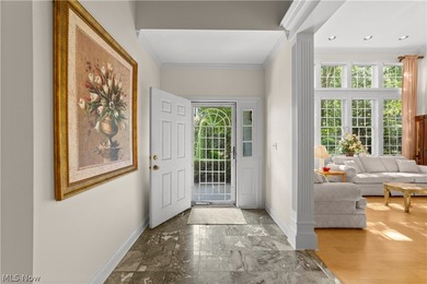 Located in one of Bratenahl's premier gated communities, this - photo 3