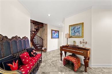 Located in one of Bratenahl's premier gated communities, this - photo 4