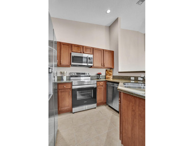 Motivated seller! This move-in-ready 2-bedroom, 2-bath townhome - photo 2