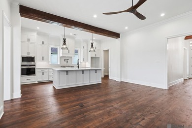 Welcome to this beautifully designed 4-bedroom, 3-bath home in - photo 3
