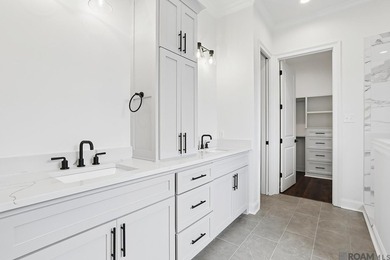 Welcome to this beautifully designed 4-bedroom, 3-bath home in - photo 7