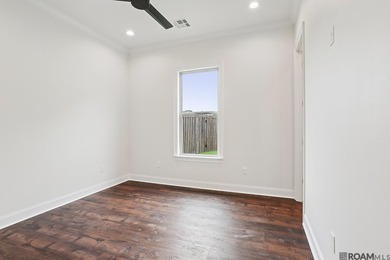 Welcome to this beautifully designed 4-bedroom, 3-bath home in - photo 8