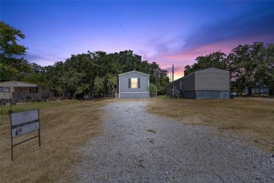 Lake Home For Sale in Pelican Bay, Texas