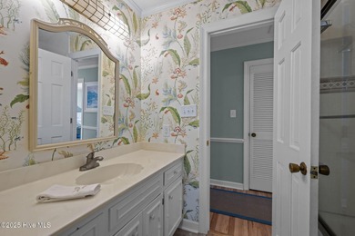 Nestled atop a high dune in one of the island's most coveted