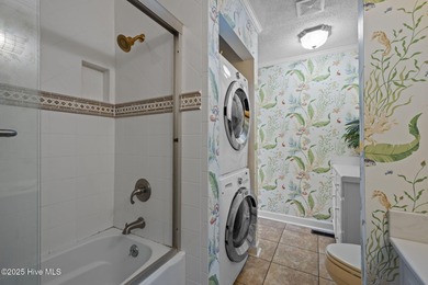 Nestled atop a high dune in one of the island's most coveted