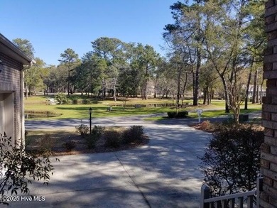 This beautiful home, across from a pretty pond, is located along