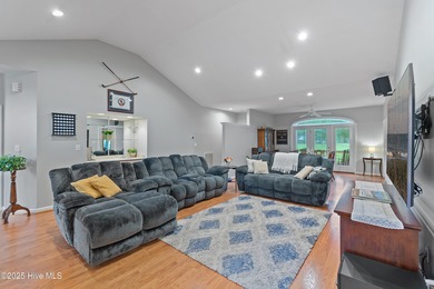 This beautiful home, across from a pretty pond, is located along