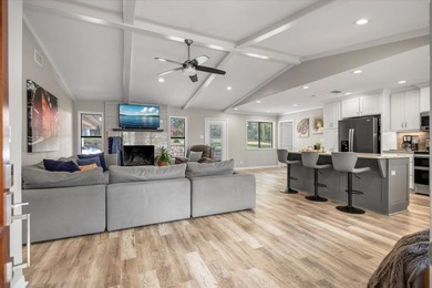 Welcome to a lake view haven where four bedrooms, three baths - photo 4