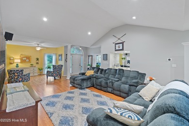 This beautiful home, across from a pretty pond, is located along