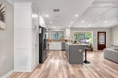 Welcome to a lake view haven where four bedrooms, three baths - photo 8