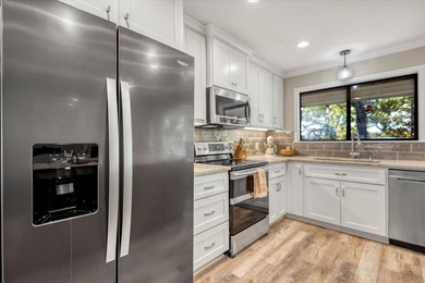 Welcome to a lake view haven where four bedrooms, three baths - photo 9