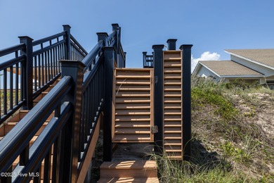 Nestled atop a high dune in one of the island's most coveted